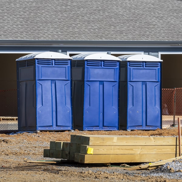 what is the cost difference between standard and deluxe portable toilet rentals in Elm Grove